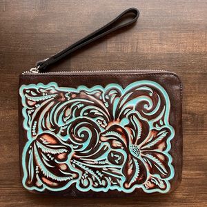 Patricia Nash Leather Wristlet/Wallet with turquoise colored embossing